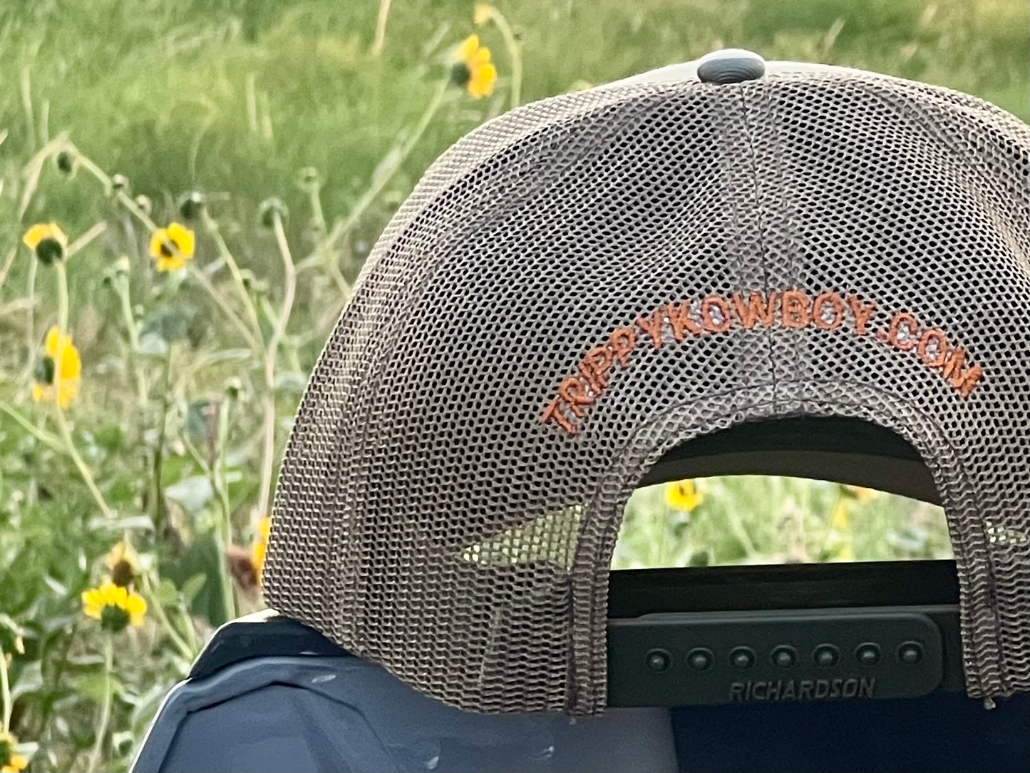 Trippy Kowboy leather patch Camo trucker hat