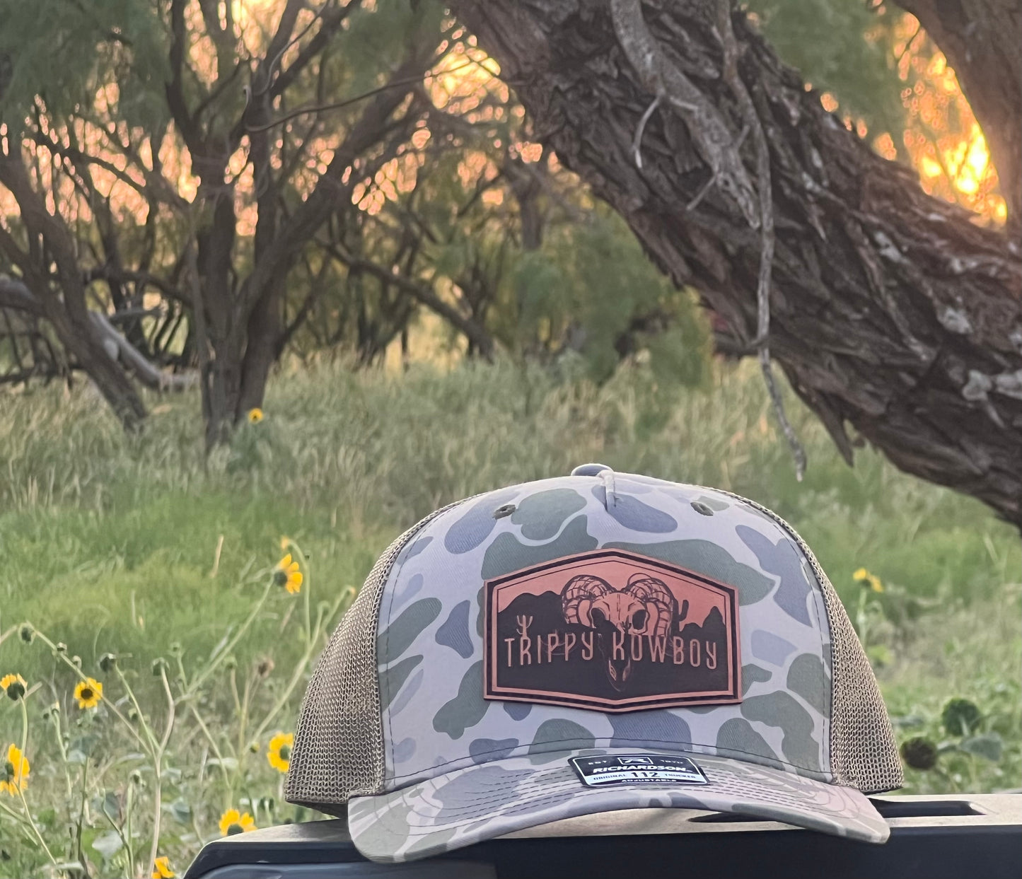 Trippy Kowboy leather patch Camo trucker hat