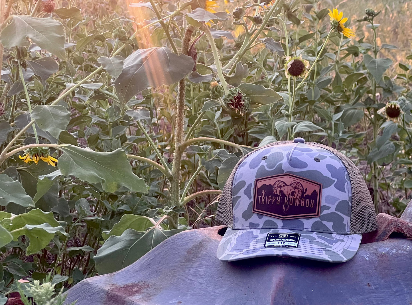 Trippy Kowboy leather patch Camo trucker hat