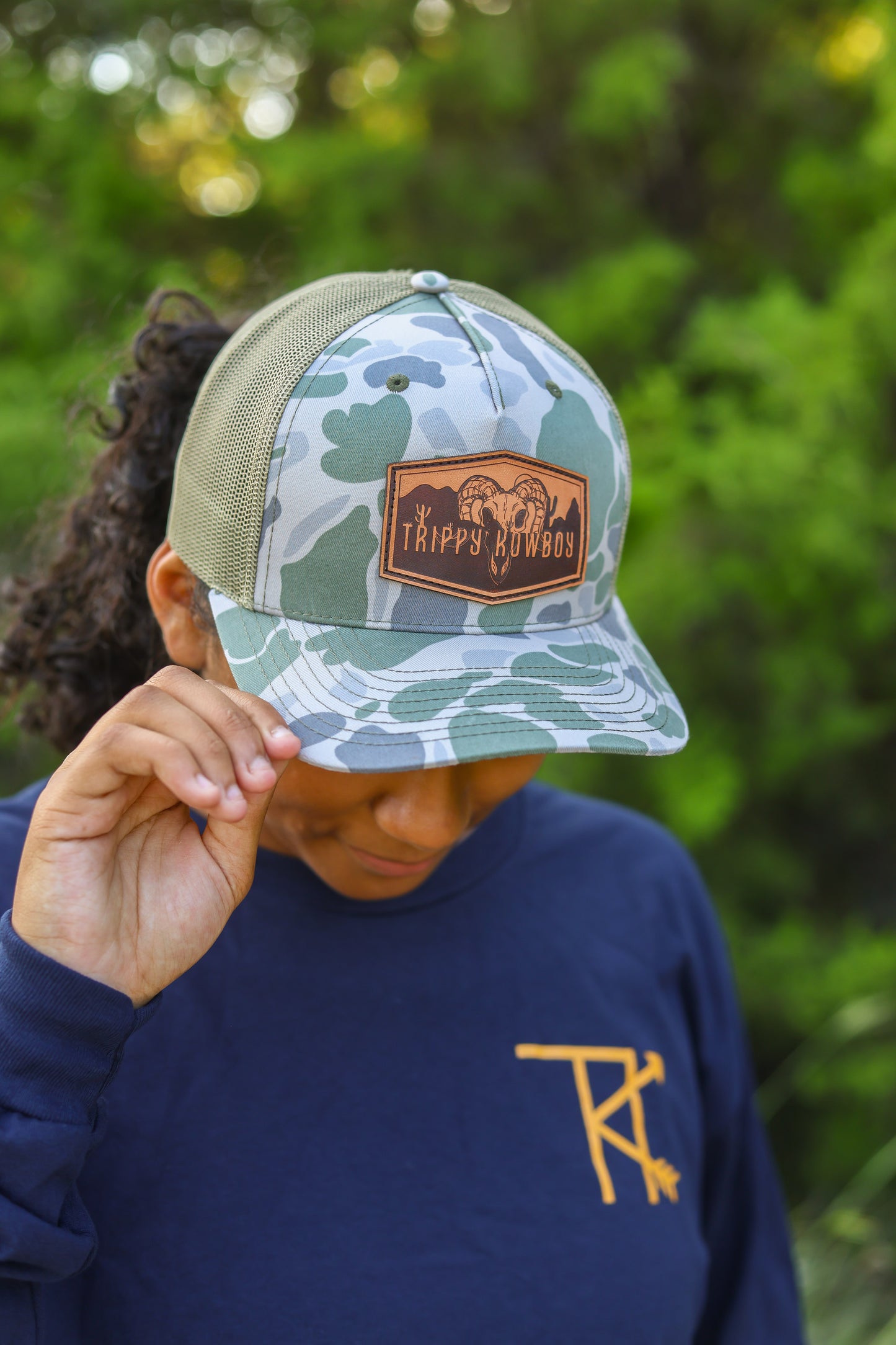 Trippy Kowboy leather patch Camo trucker hat