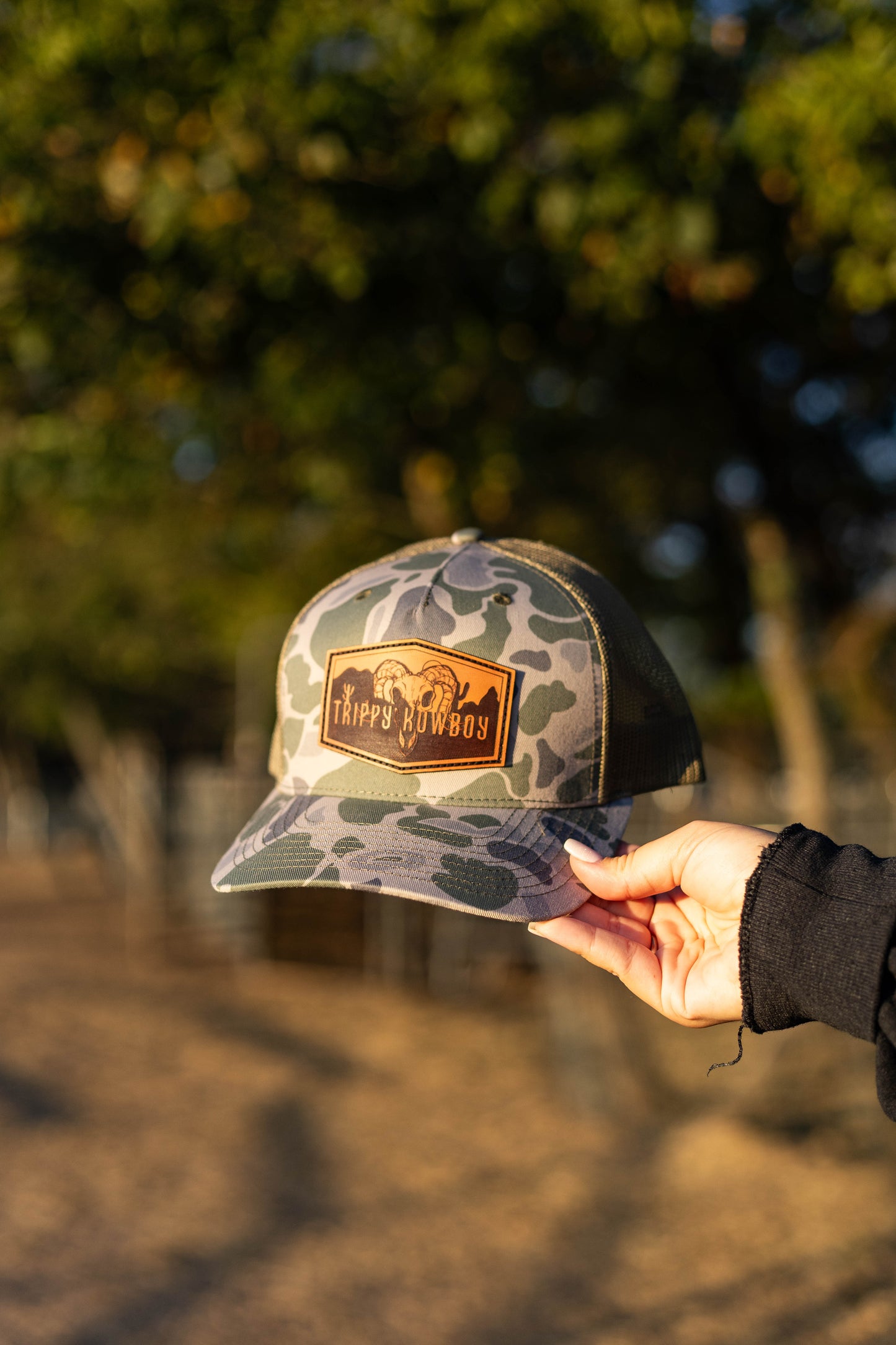 Trippy Kowboy leather patch Camo trucker hat
