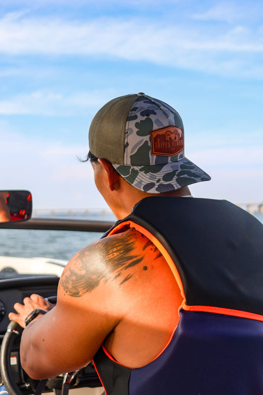 Trippy Kowboy leather patch Camo trucker hat